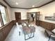 Executive office with wood paneling, natural light, and modern furnishings at 22148 Red Hawk Ln, Golden, CO 80401