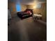 Bedroom with a bed, table, and window at 14141 E Baltic Pl, Aurora, CO 80014