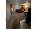 Bedroom featuring cozy decor, a bed, window, and ample space at 14141 E Baltic Pl, Aurora, CO 80014