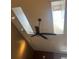 Unique ceiling design with skylights, a ceiling fan, and recessed lighting at 14141 E Baltic Pl, Aurora, CO 80014