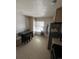 Kitchen with stainless steel appliances, an adjacent table, and generous natural light at 14141 E Baltic Pl, Aurora, CO 80014