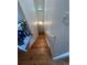 Bright stairwell with hardwood steps and white banister guides you to the lower level at 14141 E Baltic Pl, Aurora, CO 80014