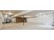 Unfinished basement with concrete floor, exposed ceiling, and visible framework for future customization at 56432 E 23Rd Ave, Strasburg, CO 80136
