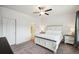Bedroom with soft carpet, neutral walls, and comfortable bed frame at 56432 E 23Rd Ave, Strasburg, CO 80136