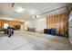 Large garage featuring ample space, and a well-organized interior at 56432 E 23Rd Ave, Strasburg, CO 80136