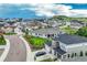 Aerial view showcases a well-planned neighborhood with mature trees and manicured lawns at 1465 Gentle Rain Dr, Castle Rock, CO 80109