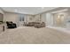 Finished basement with a cozy seating area, massage chair, and modern decor at 1465 Gentle Rain Dr, Castle Rock, CO 80109