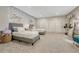 Cozy bedroom with twin beds, ample closet space, and decorative lighting, offering a comfortable retreat at 1465 Gentle Rain Dr, Castle Rock, CO 80109