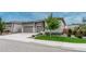 Charming home featuring a three-car garage, modern exterior, and manicured lawn at 1465 Gentle Rain Dr, Castle Rock, CO 80109