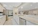 Modern kitchen featuring stainless steel appliances, granite countertops, and a functional layout, perfect for cooking and entertaining at 1465 Gentle Rain Dr, Castle Rock, CO 80109
