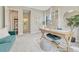 Cozy office with a view through to an attached bathroom; a comfortable space to work from home at 1465 Gentle Rain Dr, Castle Rock, CO 80109