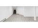 Finished basement with durable floors, white walls, access to stairs, and plenty of potential at 6982 Estes Dr, Arvada, CO 80004