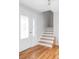Entryway with a decorative glass door and staircase at 6982 Estes Dr, Arvada, CO 80004