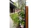 Charming landscaping featuring vibrant flowers and lush green foliage, adding curb appeal at 6982 Estes Dr, Arvada, CO 80004
