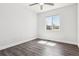 Empty bedroom with modern flooring, a window, and fresh paint at 9508 Elk Mountain Cir, Littleton, CO 80125