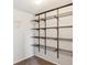 Walk-in closet featuring shelving system for optimal storage and organization at 9508 Elk Mountain Cir, Littleton, CO 80125