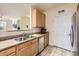 Functional kitchen with stainless steel sink and modern appliances at 1465 Blue Sky Cir # 17-203, Erie, CO 80516