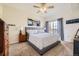 Serene main bedroom with balcony access and natural light at 1465 Blue Sky Cir # 17-203, Erie, CO 80516