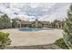 Community swimming pool with expansive deck, gazebo and inviting pristine blue water, perfect for relaxation at 1465 Blue Sky Cir # 17-203, Erie, CO 80516