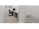 Office nook in basement with built in desk and grey carpet at 16421 Askins Loop, Parker, CO 80134