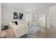 Bright and airy living room with modern decor, stylish rug, and comfortable seating arrangement at 16421 Askins Loop, Parker, CO 80134