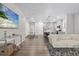 Spacious open-concept area with modern kitchen, dining area, and comfortable living space at 16421 Askins Loop, Parker, CO 80134