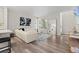 Bright living room with a comfortable sofa, modern decor, and ample natural light, creating a relaxing atmosphere at 16421 Askins Loop, Parker, CO 80134