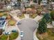 Bird's-eye view of the neighborhood highlighting the home's location in a quiet cul-de-sac with mature trees at 7604 S Lamar Ct, Littleton, CO 80128
