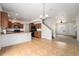 Bright kitchen offering lots of light, an open design, and a seamless transition into the living room at 5572 Killarney St, Denver, CO 80249