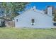Side yard featuring a well-maintained lawn, adding to the property's curb appeal at 8168 Washington St # 46, Denver, CO 80229