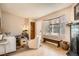 Comfortable living room boasting a large window, hardwood floors, and a neutral color palette at 8168 Washington St # 46, Denver, CO 80229