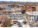 Panoramic aerial view of the neighborhood showcasing surrounding buildings and distant mountains at 2640 Central Ct # 204, Denver, CO 80211