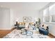 Inviting living room with a comfortable sofa, stylish decor, and a bright atmosphere at 2640 Central Ct # 204, Denver, CO 80211