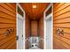 Modern stairwell with wood ceilings and metal railings leading to upper units at 2640 Central Ct # 204, Denver, CO 80211