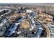 Aerial view of a neighborhood with a mix of multi-story buildings and single-Gathering homes at 2876 W 53Rd Ave # 122, Denver, CO 80221
