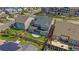 Aerial view of the backyard showing the lawn, fence, and patio area at 14997 Elsinore Ave, Parker, CO 80134