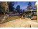 Outdoor patio with gazebo, stone retaining wall and ample space for relaxing and entertaining at 683 Ridgemont Cir, Highlands Ranch, CO 80126