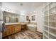 Spacious bathroom featuring tile flooring, vanity with granite countertops, and a soaking tub at 683 Ridgemont Cir, Highlands Ranch, CO 80126