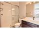 Modern bathroom with glass-enclosed shower and a vanity with a white countertop at 5926 Hickory Oaks Trl, Castle Rock, CO 80104