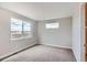 Bright bedroom featuring large windows offering a view of the surrounding landscape at 5926 Hickory Oaks Trl, Castle Rock, CO 80104