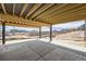 Covered patio showcasing neighborhood views at 5926 Hickory Oaks Trl, Castle Rock, CO 80104
