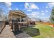 A backyard with a deck, patio, and lawn is perfect for outdoor relaxation and entertainment at 10622 Van Gordon Way, Broomfield, CO 80021