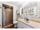 Well-maintained bathroom with a tiled shower, vanity, and ample storage at 10622 Van Gordon Way, Broomfield, CO 80021