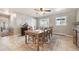 Charming dining room features a wooden table, sliding glass doors, and ceiling fan at 10622 Van Gordon Way, Broomfield, CO 80021