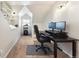 Dedicated home office with desk, chair, multiple monitors, and great natural light at 10622 Van Gordon Way, Broomfield, CO 80021