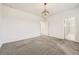Spacious bedroom with neutral carpet with ensuite bathroom and walk in closet at 9111 W 100Th Way, Broomfield, CO 80021