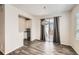 Open concept dining area with stylish pendant lighting and sliding glass doors to patio at 9111 W 100Th Way, Broomfield, CO 80021