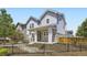 Charming two-story home boasts stone accents, a welcoming front porch, and a beautifully landscaped yard at 9111 W 100Th Way, Broomfield, CO 80021