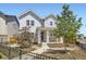 Inviting two-story home with a charming front porch and meticulously maintained landscaping at 9111 W 100Th Way, Broomfield, CO 80021