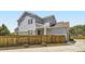 Charming home with a fenced backyard and a blend of stone and siding accents at 9111 W 100Th Way, Broomfield, CO 80021
